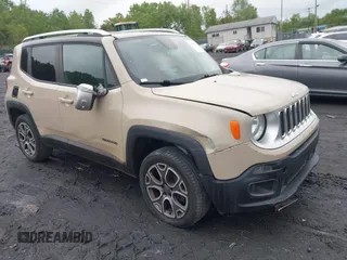 2015 Jeep Renegade Limited z VIN ZACCJBDT0FPB55402, wystawiony jako IAAI lot #42351032 z przebiegiem 105 059 mil mil oraz . Historia ofert i sprzedaży dostępna na DreamBid. Obrazek 1.