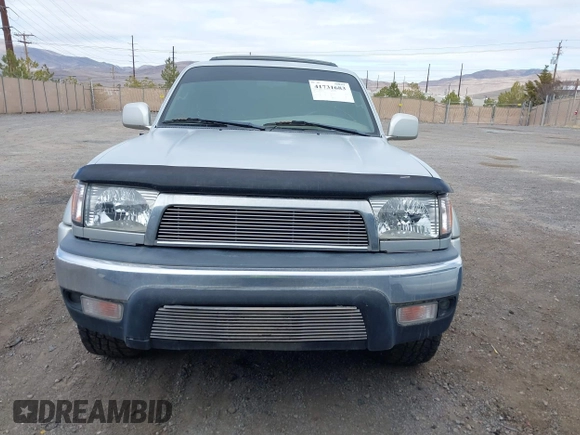 2002 Toyota 4Runner SR5 z VIN JT3GN86R720234521, wystawiony jako IAAI lot #41731683 z przebiegiem 205 346 mil mil oraz . Historia ofert i sprzedaży dostępna na DreamBid. Obrazek 6.