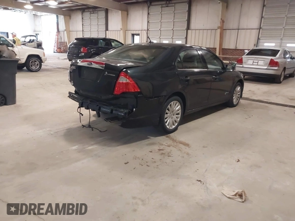 2010 Ford Fusion Hybrid with VIN 3FADP0L39AR140087, listed as a IAAI auction lot 41737705 with 118,563 mi miles. Bid and sale history available at carsss.com. Image 4.