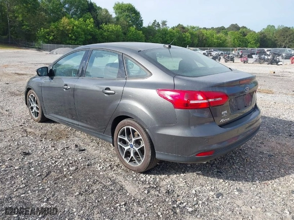 2017 Ford Focus SEL with VIN 1FADP3H22HL305908, listed as a IAAI auction lot 42084489 with 94,757 mi miles. Bid and sale history available at carsss.com. Image 3.