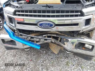 2019 Ford F-150 XL with VIN 1FTFW1E58KFA68470, listed as a IAAI auction lot 40823381 with 174,401 mi miles and . Bid and sale history available at DreamBid. Image 6.