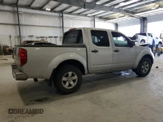 2012 Nissan Frontier SV with VIN 1N6AD0EV3CC407761, listed as a Copart auction lot 54012935 with 142,206 mi miles and Salvage title. Bid and sale history available at DreamBid. Image 3.