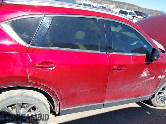 2020 Mazda CX-5 Grand Touring with VIN JM3KFADM3L0761286, listed as a IAAI auction lot 41715379 with 145,656 mi miles and . Bid and sale history available at DreamBid. Image 14.