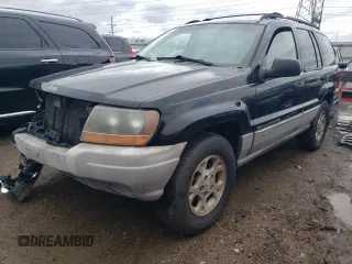 2000 Jeep Grand Cherokee Laredo z VIN 1J4GW48S7YC100739, wystawiony jako Copart lot #89072965 z przebiegiem 150 333 mil mil oraz Szkoda całkowita • Salvage title. Historia ofert i sprzedaży dostępna na DreamBid. Obrazek 1.