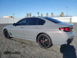 2022 BMW 5 Series 530e with VIN WBA13AG08NCL01996, listed as a Copart auction lot 89193865 with 21,314 mi miles and Salvage title. Bid and sale history available at DreamBid. Image 2.