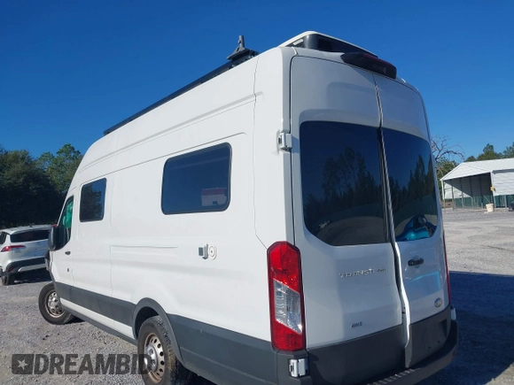 2022 Ford Transit Cargo with VIN 1FTBW3U85NKA01097, listed as a IAAI auction lot 41076643 with 24,786 mi miles and . Bid and sale history available at DreamBid. Image 3.
