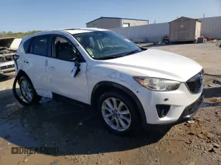 2014 Mazda CX-5 Grand Touring with VIN JM3KE4DY6E0376413, listed as a Copart auction lot 53204935 with 126,791 mi miles and Salvage Title. Bid and sale history available at DreamBid. Image 4.