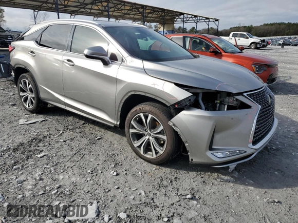 2022 Lexus RX with VIN 2T2HZMAA7NC254417, listed as a Copart auction lot 44433095 with 26,926 mi miles and Salvage Title. Bid and sale history available at carsss.com. Image 4.