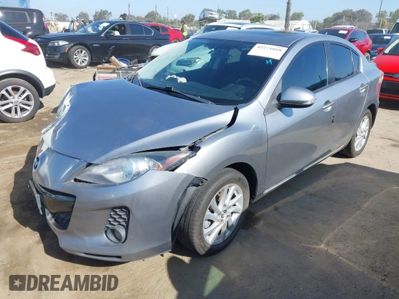 2013 Mazda 3 i Grand Touring z VIN JM1BL1WP0D1736124, wystawiony jako IAAI lot #42271018 z przebiegiem 124 478 mil mil oraz . Historia ofert i sprzedaży dostępna na DreamBid. Obrazek 19.