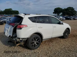 2016 Toyota RAV4 SE with VIN JTMJFREV5GD184074, listed as a Copart auction lot 60116955 with 182,240 mi miles and Salvage title. Bid and sale history available at DreamBid. Image 3.
