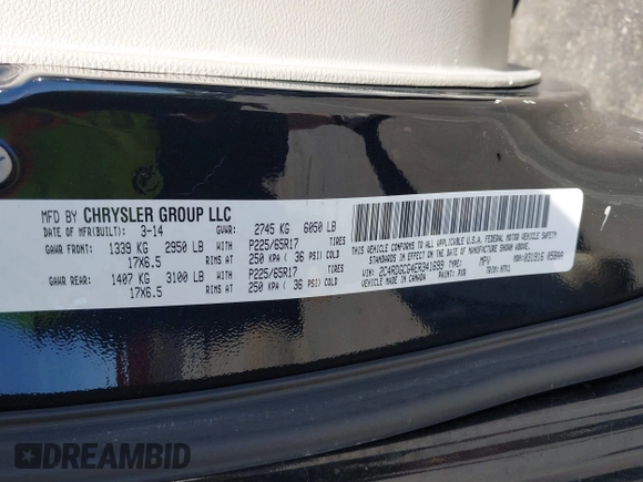 2014 Dodge Grand Caravan SXT with VIN 2C4RDGCG4ER341699, listed as a IAAI auction lot 42064523 with 234,422 mi miles and . Bid and sale history available at DreamBid. Image 9.