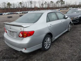 2010 Toyota Corolla with VIN 2T1BU4EE0AC245879, listed as a IAAI auction lot 41322200 with 128,574 mi miles. Bid and sale history available at carsss.com. Image 4.
