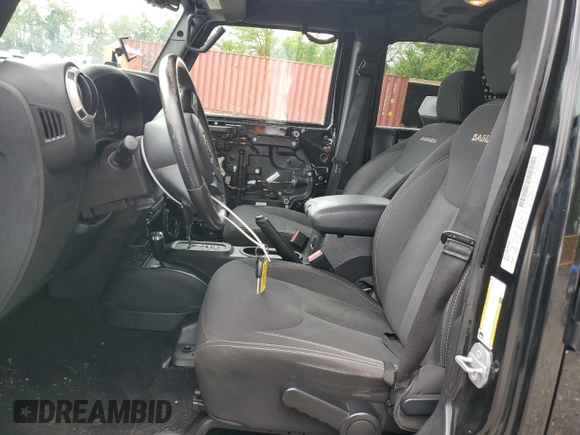 2016 Jeep Wrangler Unlimited Sahara with VIN 1C4BJWEG8GL150249, listed as a Copart auction lot 57574525 with 104,206 mi miles and Salvage title. Bid and sale history available at DreamBid. Image 7.
