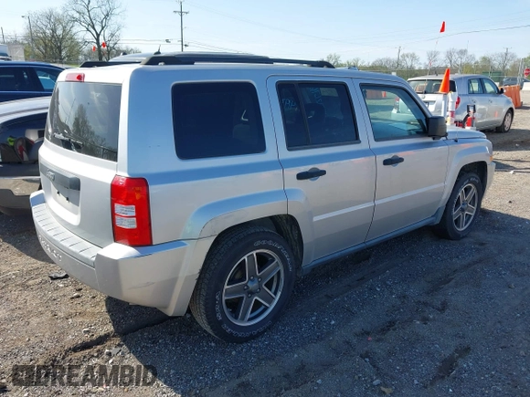 2009 Jeep Patriot Sport z VIN 1J4FT28B29D110728, wystawiony jako IAAI lot #41932676 z przebiegiem 194 442 mil mil oraz . Historia ofert i sprzedaży dostępna na DreamBid. Obrazek 4.