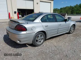 2004 Pontiac Grand Am GT z VIN 1G2NW52E74C179558, wystawiony jako IAAI lot #42191752 z przebiegiem 256 688 mil mil oraz . Historia ofert i sprzedaży dostępna na DreamBid. Obrazek 4.