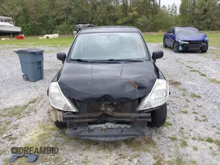 2009 Nissan Versa SL z VIN 3N1BC13E49L488417, wystawiony jako IAAI lot #41943795 z przebiegiem 221 010 mil mil oraz . Historia ofert i sprzedaży dostępna na DreamBid. Obrazek 12.