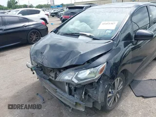 2015 Honda Fit EX-L z VIN 3HGGK5H81FM723962, wystawiony jako IAAI lot #42455367 z przebiegiem 104 859 mil mil oraz . Historia ofert i sprzedaży dostępna na DreamBid. Obrazek 6.