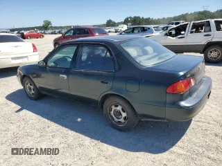 1999 Toyota Corolla VE с VIN 1NXBR12E4XZ240034, выставлен на аукционе Copart как лот 55860355 с пробегом 252 442 миль миль и Списание • Salvage title. История ставок и продаж доступна на DreamBid. Изображение 2.