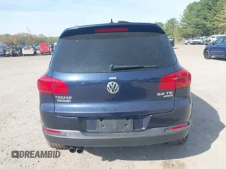 2014 Volkswagen Tiguan S z VIN WVGBV3AX7EW545538, wystawiony jako IAAI lot #42083281 z przebiegiem 129 227 mil mil oraz . Historia ofert i sprzedaży dostępna na DreamBid. Obrazek 16.