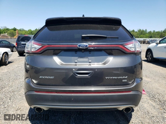 2015 Ford Edge Titanium z VIN 2FMPK4K8XFBB98334, wystawiony jako Copart lot #56953495 z przebiegiem 110 129 mil mil oraz Szkody całkowita. Historia ofert i sprzedaży dostępna na DreamBid. Obrazek 6.