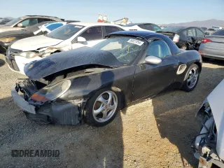 2000 Porsche Boxster z VIN WP0CA2984YU627674, wystawiony jako Copart lot #86027054 z przebiegiem 112 153 mil mil oraz Szkody całkowita. Historia ofert i sprzedaży dostępna na DreamBid. Obrazek 1.