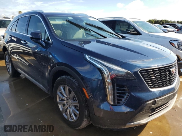 2021 Cadillac XT4 FWD Premium Luxury z VIN 1GYFZCR48MF056210, wystawiony jako Copart lot #73706384 z przebiegiem Nie podano mil oraz Nie do naprawy • Non repairable. Historia ofert i sprzedaży dostępna na DreamBid. Obrazek 4.