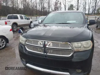 2013 Dodge Durango Crew with VIN 1C4RDHDG5DC613835, listed as a IAAI auction lot 41910643 with 155,827 mi miles and . Bid and sale history available at DreamBid. Image 6.