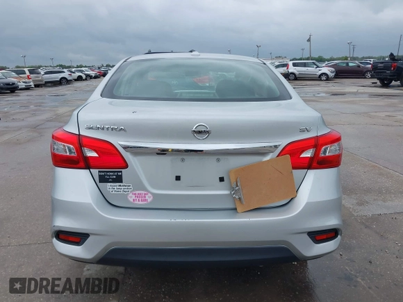 2019 Nissan Sentra S z VIN 3N1AB7AP7KY425276, wystawiony jako IAAI lot #41745256 z przebiegiem 72 306 mil mil oraz . Historia ofert i sprzedaży dostępna na DreamBid. Obrazek 17.