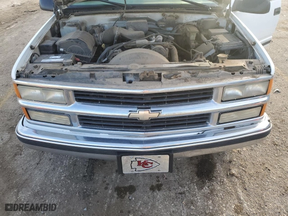 1999 Chevrolet Tahoe with VIN 1GNEC13RXXJ519095, listed as a Copart auction lot 43254645 with 176,861 mi miles and Salvage Title. Bid and sale history available at carsss.com. Image 12.