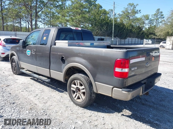 2005 Ford F-150 XLT with VIN 1FTPX12575NA61851, listed as a IAAI auction lot 41713974 with 251,639 mi miles. Bid and sale history available at carsss.com. Image 3.