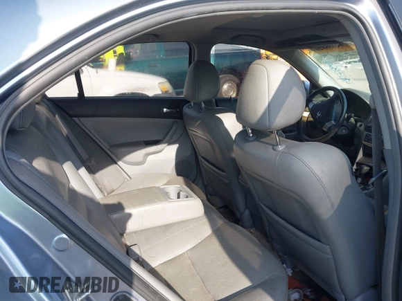2004 Acura TSX with VIN JH4CL96844C030143, listed as a IAAI auction lot 42035820 with 216,588 mi miles. Bid and sale history available at carsss.com. Image 8.