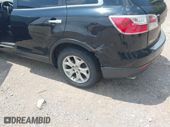 2012 Mazda CX-9 Grand Touring with VIN JM3TB3DA7C0348806, listed as a IAAI auction lot 42608518 with 229,337 mi miles and . Bid and sale history available at DreamBid. Image 14.