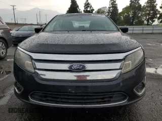 2010 Ford Fusion Hybrid with VIN 3FADP0L31AR228843, listed as a Copart auction lot 59587165 with 308,260 mi miles and Clean title. Bid and sale history available at DreamBid. Image 5.