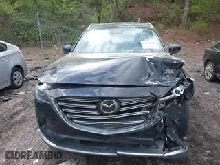 2021 Mazda CX-9 Carbon Edition with VIN JM3TCADY4M0517535, listed as a IAAI auction lot 41821261 with 60,053 mi miles. Bid and sale history available at carsss.com. Image 6.