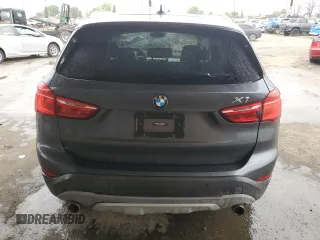 2016 BMW X1 xDrive28i with VIN WBXHT3C31G5E55041, listed as a Copart auction lot 48928705 with 104,799 mi miles and Salvage Title. Bid and sale history available at carsss.com. Image 6.