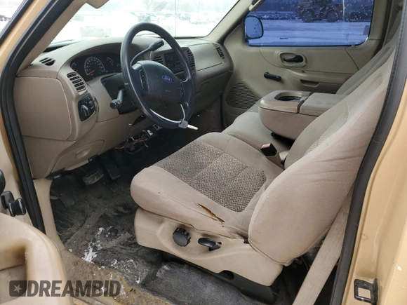 2002 Ford F-150 XL with VIN 1FTRF17202KD31428, listed as a Copart auction lot 45582885 with 218,548 mi miles and Salvage title. Bid and sale history available at DreamBid. Image 7.