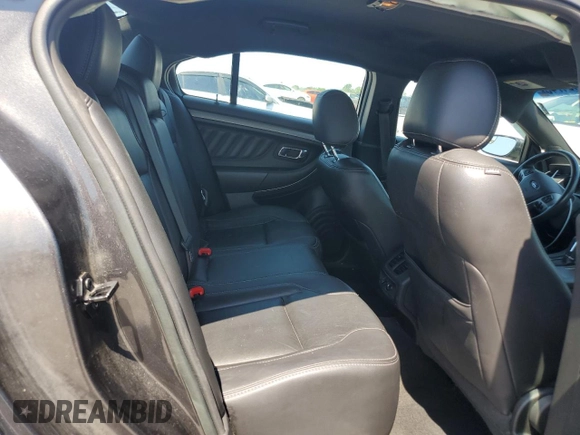 2015 Ford Taurus SEL z VIN 1FAHP2E83FG125234, wystawiony jako Copart lot #54404745 z przebiegiem 107 311 mil mil oraz Szkody całkowita. Historia ofert i sprzedaży dostępna na DreamBid. Obrazek 10.
