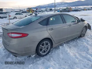 2016 Ford Fusion SE Hybrid with VIN 3FA6P0LU8GR127311, listed as a IAAI auction lot 41242945 with 1 mi miles. Bid and sale history available at carsss.com. Image 4.