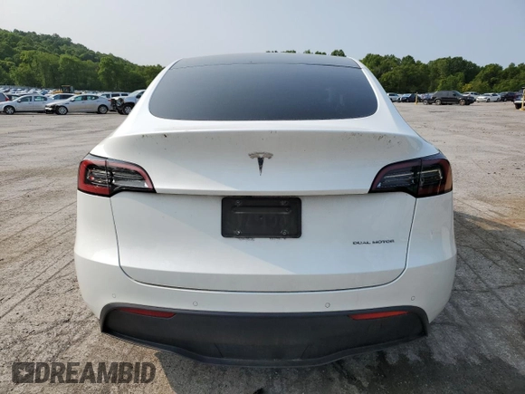 2022 Tesla Model Y Long Range z VIN 7SAYGDEE5NF355624, wystawiony jako Copart lot #58058465 z przebiegiem 33 784 mil mil oraz Szkoda całkowita • Salvage title. Historia ofert i sprzedaży dostępna na DreamBid. Obrazek 6.