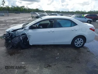 2016 Toyota Corolla L z VIN 2T1BURHE0GC641909, wystawiony jako IAAI lot #42583396 z przebiegiem 124 790 mil mil oraz . Historia ofert i sprzedaży dostępna na DreamBid. Obrazek 15.