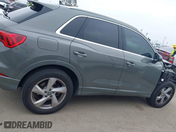 2020 Audi Q3 Premium with VIN WA1AECF32L1061271, listed as a IAAI auction lot 42038795 with 23,902 mi miles and . Bid and sale history available at DreamBid. Image 14.
