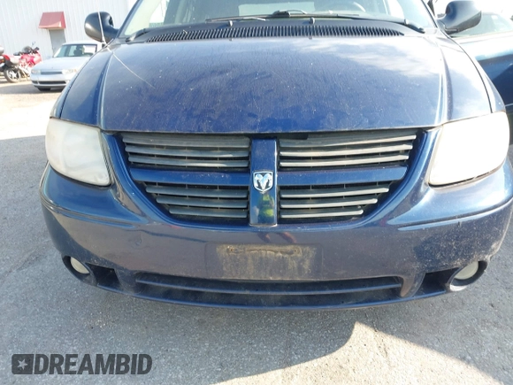 2005 Dodge Caravan SXT with VIN 2D4GP44L65R565519, listed as a IAAI auction lot 42730269 with 124,848 mi miles and . Bid and sale history available at DreamBid. Image 6.