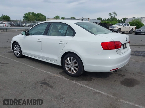 2014 Volkswagen Jetta Sedan SE w/Connectivity/Sunroof PZEV with VIN 3VWD17AJ5EM326425, listed as a IAAI auction lot 42066054 with 125,004 mi miles. Bid and sale history available at carsss.com. Image 3.