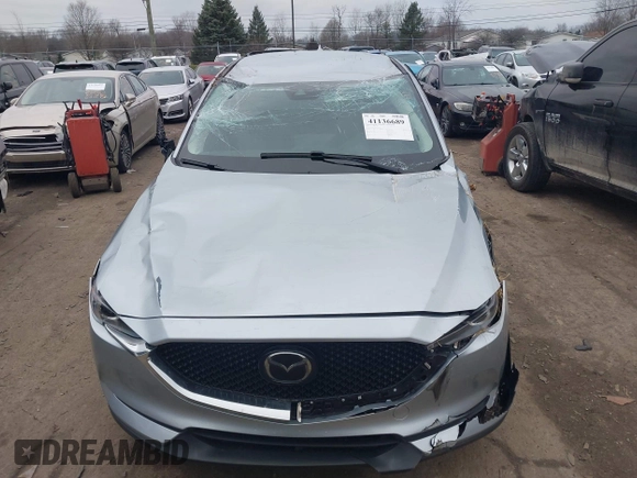 2021 Mazda CX-5 Touring with VIN JM3KFBCM7M0356685, listed as a IAAI auction lot 41136689 with 45,224 mi miles. Bid and sale history available at carsss.com. Image 6.