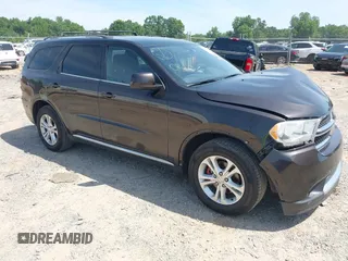 2013 Dodge Durango SXT with VIN 1C4RDJAG7DC580249, listed as a IAAI auction lot 42535723 with 199,626 mi miles and . Bid and sale history available at DreamBid. Image 1.