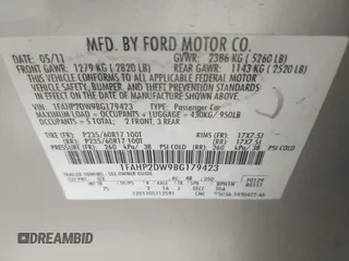 2011 Ford Taurus SE with VIN 1FAHP2DW9BG179423, listed as a IAAI auction lot 39683731 with 297,445 mi miles. Bid and sale history available at carsss.com. Image 9.