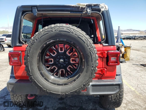 2019 Jeep Wrangler Unlimited Rubicon with VIN 1C4HJXFN7KW519171, listed as a Copart auction lot 56251325 with 69,094 mi miles and Salvage title. Bid and sale history available at DreamBid. Image 6.