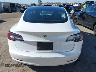 2023 Tesla Model 3 z VIN 5YJ3E1EA2PF410378, wystawiony jako IAAI lot #42265294 z przebiegiem 16 000 mil mil oraz . Historia ofert i sprzedaży dostępna na DreamBid. Obrazek 16.