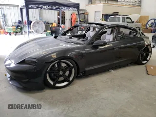 2021 Porsche Taycan Turbo z VIN WP0AC2Y14MSA63197, wystawiony jako Copart lot #68189143 z przebiegiem Nie podano mil oraz . Historia ofert i sprzedaży dostępna na DreamBid. Obrazek 1.