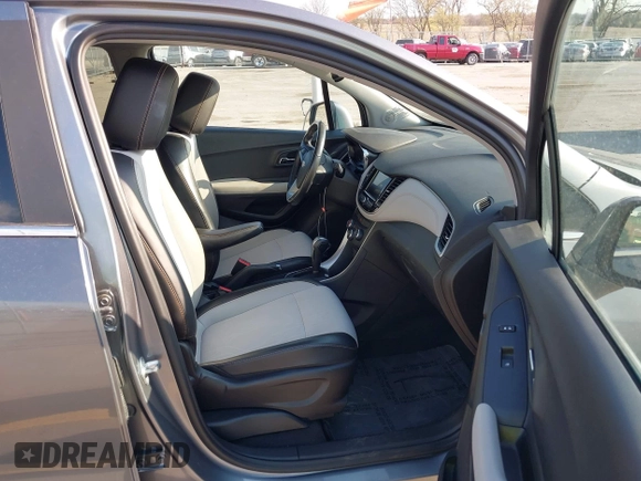 2020 Chevrolet Trax LT with VIN 3GNCJPSB7LL150297, listed as a IAAI auction lot 42077006 with 77,381 mi miles and . Bid and sale history available at DreamBid. Image 5.